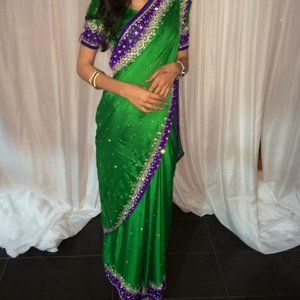 Green designer embellished saree/sari with fitted blouse